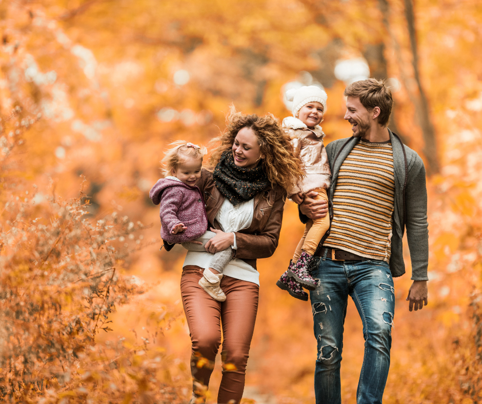 Family walking in the autumn season